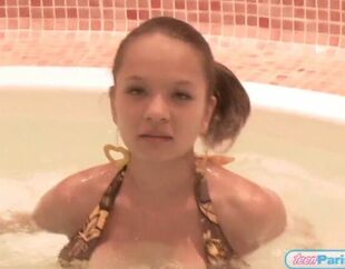 Nubile Paris Milan in a super-hot bath bathing suit just to