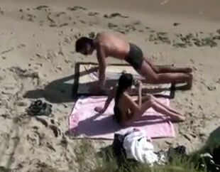 Successful beach-voyeuristic caught a little girl duo