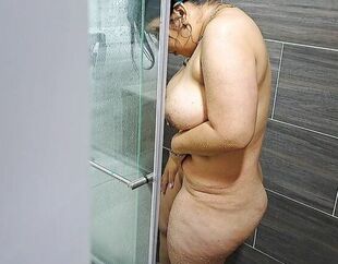 I see my stepmom take a shower, she has a highly spectacular